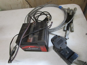 lot 81 image: Charger for wheel chair, 220 outlet...