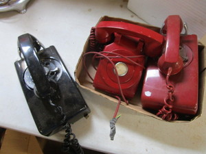 lot 89 image: Vintage desk phones, two red, one b...