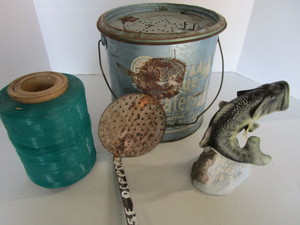 lot 114 image: Minnow bucket, fishing line spool, ...