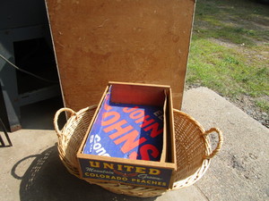 lot 150 image: Wicker clothes basket, peach crate,...