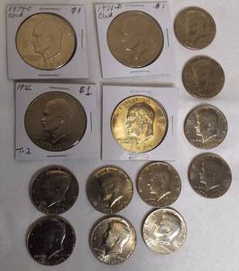 lot 22 image: Various Ike dollars and ten 1976 half dollars  All these coins are in excellent condition.
