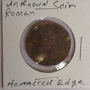 lot 25 image: Unknown Roman Coin with a Hammered Edge - Very Old