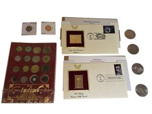 lot 27 image: A mix of different coins and stamps, including a special silver German coin from 1874.