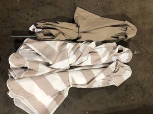 lot 34 image: Lot of Assorted Patio Umbrellas Various Models and Conditions Customer Returns See Pictures