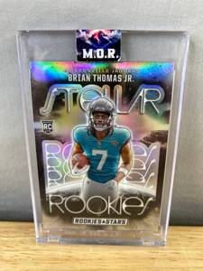 lot 469 image: Brian Thomas Jr. 2024 Panini Rookies & Stars Stellar NFL Rookie Card - Jacksonville Jaguars J