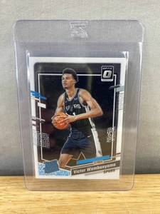 lot 472 image: 2023-24 Donruss Optic Victor Wembanyama San Antonio Spurs Rated Rookie NBA Card J