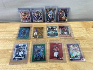 lot 520 image: 12 NFL Football Card Lot - Inserts, Rookies, Holo & Prizm Stars J