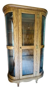 lot 12 image: Oak Curio Cabinet with Glass Doors and Shelves