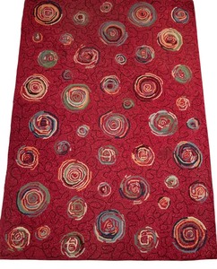 lot 32 image: Red Area Rug with Circular Pattern