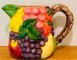 lot 132 image: Decorative Pier 1 Imports Fruit Motif Ceramic Pitcher