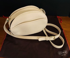 lot 24 image: K - Coach Vintage Emmie Flap  Chester Circle Cream Leather Crossbody Bag with Dust Bag