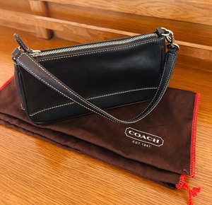 lot 100 image: K - Coach Black Leather Handbag with Dust Bag