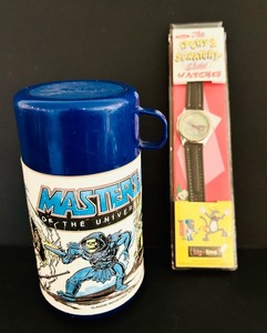 lot 158 image: LR - Vintage Masters of the Universe Aladdin Thermos and Itchy & Scratchy Show Watch Set