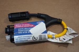 lot 162 image: Camco Power Grip RV Adapter 30A Male to 15A Female