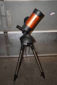 lot 10B image: Celestron NexStar 4SE Electronic Telescope on Tripod
