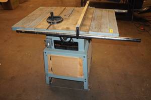 lot 10C image: Delta 10 Table Saw on Rolling Cart