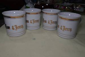 lot 106 image: Set of 4 Tom & Jerry Mugs