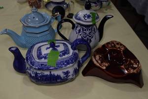 lot 110 image: 3 Tea Pots and Pot Warmer