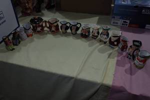 lot 127 image: Assorted Head Mugs