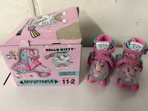 lot 43 image: Size 11-12 Hello Kitty Adjustable Sizing Roller Skates