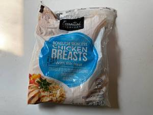 lot 131 image: EE. 3lbs Boneless Chicken Breasts-Possible 12 Cut Slit From Case Opening