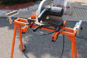 lot 2 image: Skill Saw with Port A Mate Rolling Stand & Blades