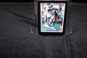 lot 32 image: 1994 Topps Kirby Puckett AutographedSigned Baseball Card with Autograph Ticket