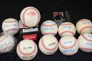 lot 40 image: Collection of 11 Baseballs Babe Ruth, Roger Clemens Rawlings American & National League & World Series