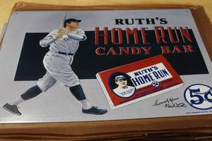 lot 74 image: 15 Metal Babe Ruth Candy Bar Signs