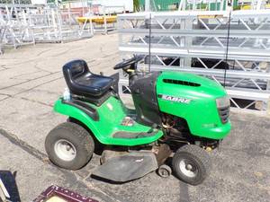 lot 37 image: Sabre Riding Lawn Mower needs repair