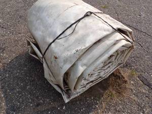 lot 61 image: Large Tarp White Good For Woodpile may have holes or rips