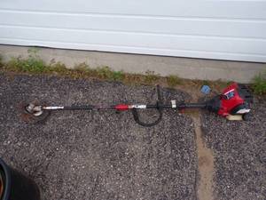 lot 74 image: Troy Bilt Brush Cutter
