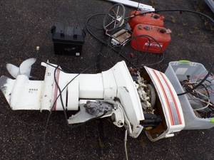 lot 112 image: 50 HP Johnson Outboard Motor with Controls, 2 Gas tanks, Battery, Consignor states Runs