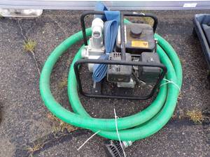 lot 115 image: Red Lion Water pump with Suction and Discharge Hose