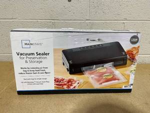 lot 127 image: Mainstays Vacuum Sealer with Built-in Cutter and Roll Storage