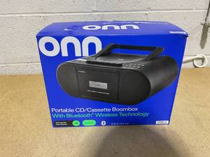lot 145 image: onn. Portable CDCassette Boombox with Bluetooth Wireless Technology