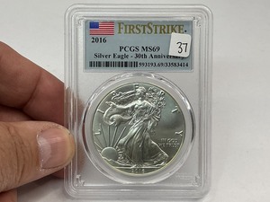 lot 37 image: 2016 PCGS ASE MS69