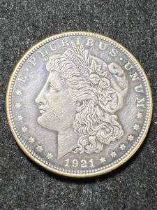 lot 38 image: 1921-D US MORGAN SILVER DOLLAR