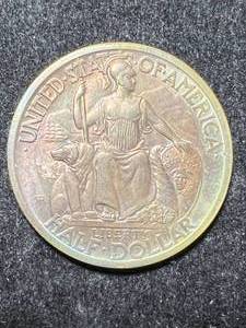 lot 52 image: 1935 US SAN DIEGO COMMEM HALF DOLLAR