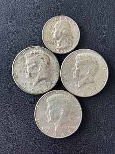 lot 2 image: Kennedy Half Dollars 40% Silver and 1957 Silver Washington Quarter