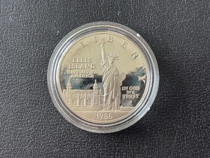 lot 12 image: 1986-S Statue of Liberty Silver Dollar Proof