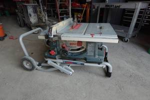 lot 242 image: Bosch 10 Worksite Table Saw on Rolling Stand