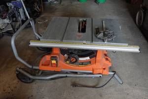 lot 244 image: Ridgid 10 Table Saw on Rolling Stand