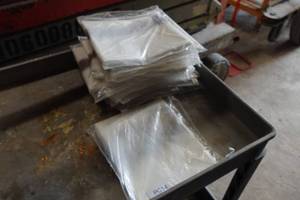 lot 392 image: 14 Plastic Sheets - 55 x 45 x 73