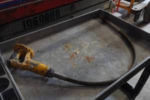 lot 312 image: DeWalt Cordless Concrete Vibrator