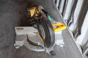 lot 142 image: DeWalt DW716 12 Dual Bevel Compound Miter Saw