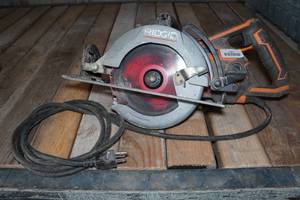 lot 280 image: Ridgid R32104 7-14 Worm Drive Circular Saw