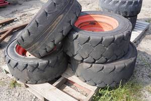 lot 165 image: Skid Steer Wheels and Tires