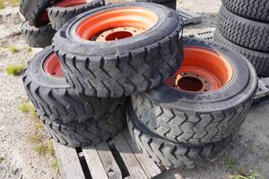 lot 162 image: Skid Steer Wheels and Tires
