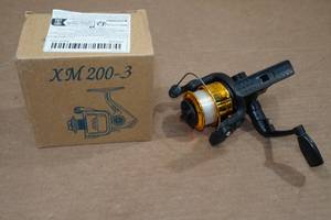 lot 31 image: XM 200-3 Right Handed Fishing Reel